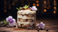 Traditional italian dessert tiramisu decorated with edible flowers