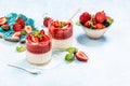 Traditional italian dessert vanilla strawberry panna cotta. vertical image. top view. place for text Royalty Free Stock Photo