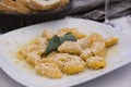 A traditional Italian dish: Pumpkin Gnocchi with Parmesan cheese