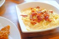 Traditional Italian dish, spaghetti carbonara and cream sauce with bacon and mushroom on white dish Royalty Free Stock Photo