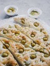 Traditional Italian focaccia bread with olives, rosemary, salt and olive oil. Homemade focaccia. Royalty Free Stock Photo