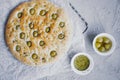 Traditional Italian focaccia bread with olives, rosemary, salt and olive oil. Homemade focaccia. Royalty Free Stock Photo