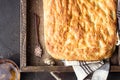 Traditional Italian focaccia bread with salt and olive oil. Homemade flat bread focaccia. Royalty Free Stock Photo