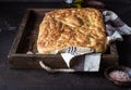 Traditional Italian focaccia bread with salt and olive oil. Homemade flat bread focaccia. Royalty Free Stock Photo