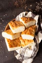 Traditional Italian focaccia bread with salt and olive oil. Homemade flat bread focaccia. Royalty Free Stock Photo