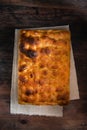 Traditional Italian Focaccia. Homemade flat bread focaccia on wooden table.