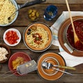 Traditional Italian food. Pasta spaghetti with tomato sauce, olives and garnish with wine on the wooden table Royalty Free Stock Photo