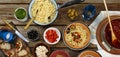 Traditional Italian food. Pasta spaghetti with tomato sauce, olives and garnish with wine on the wooden table Royalty Free Stock Photo