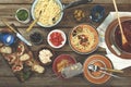 Traditional Italian food. Pasta spaghetti with tomato sauce, olives and garnish with wine on the wooden table Royalty Free Stock Photo