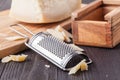 Traditional Italian hard cheese Parmesan and Grana Padano with grater