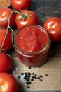 Traditional italian homemade tomato sauce in glass jar,
