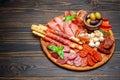 Meat and cheese plate with salami sausage, chorizo, parma and mozzarella