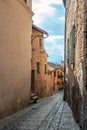 Traditional italian medieval alley and buildings in the historic center of beautiful town of Spello, in Umbria Region, Italy Royalty Free Stock Photo