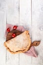 Traditional Italian oriental cuisine. closed type of pizza that is folded in half. Background image. Top view, flat lay