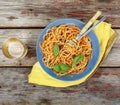 Traditional Italian pasta with tomato sauce and basil and white wine in a glass Royalty Free Stock Photo