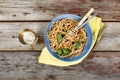 Traditional Italian pasta with tomato sauce and basil and white wine in a glass Royalty Free Stock Photo