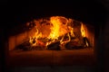 Traditional italian Pizza oven, burning wood and flames in fireplace Royalty Free Stock Photo