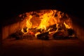 Traditional italian Pizza oven, burning wood and flames in fireplace Royalty Free Stock Photo