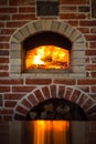 Traditional italian Pizza oven, burning wood and flames in fireplace Royalty Free Stock Photo