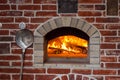 Traditional italian Pizza oven, burning wood and flames in fireplace Royalty Free Stock Photo