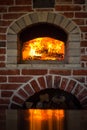 Traditional italian Pizza oven, burning wood and flames in fireplace Royalty Free Stock Photo