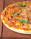 Traditional Italian pizza with prosciutto ham Royalty Free Stock Photo