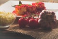 Traditional Italian Rondelli pasta with tomato sauceon rustic background