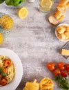 Traditional italian seafood shrimps pasta on white plate with tomatoes, basil, parmesan cheese and other ingredient for Royalty Free Stock Photo