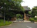 Traditional Japanese Buddhist temple gate and garden Royalty Free Stock Photo