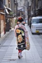 Traditional japanese costumes the kimono worn by a maika in gion corner kyoto japan