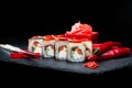 Traditional Japanese cuisine. Selective focus on sushi rolls wi Royalty Free Stock Photo