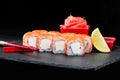 Traditional Japanese cuisine. Selective focus on sushi rolls wit Royalty Free Stock Photo