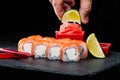 Traditional Japanese cuisine. Selective focus on sushi rolls wit Royalty Free Stock Photo