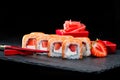 Traditional Japanese cuisine. Selective focus on sweet sushi rol Royalty Free Stock Photo