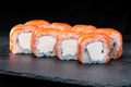 Traditional Japanese cuisine. Sushi rolls with salmon, cream che Royalty Free Stock Photo