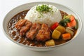 Traditional Japanese Curry Rice with Crispy Pork Cutlet, Carrots, Potatoes, and Chopped Chives in White Bowl Royalty Free Stock Photo