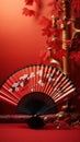 Traditional Japanese fan with red autumn leaves, fall vibes background Royalty Free Stock Photo