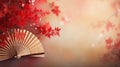 Traditional Japanese fan with red autumn leaves, fall vibes background Royalty Free Stock Photo