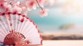 Traditional Japanese fan sensu in hot sunny weather, summer vibes background