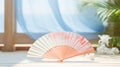 Traditional Japanese fan sensu in hot sunny weather, summer vibes background