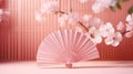 Traditional Japanese fan sensu in pink sakura blossom, spring vibes background