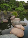 Traditional Japanese Garden with stepping stone pathways Royalty Free Stock Photo