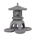 Traditional japanese garden stone lantern Royalty Free Stock Photo