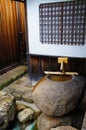 Traditional Japanese home style with bamboo fountain Royalty Free Stock Photo