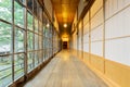 Traditional japanese house corridor with tatami floor and shoji paper doors