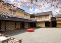 Traditional Japanese house with plum trees blooming in spring Royalty Free Stock Photo