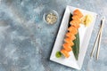 Traditional Japanese kitchen, delicious fresh sushi roll set. Sushi roll with rice, cream chees, red fish, salmon. Sushi menu, Royalty Free Stock Photo