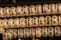 Traditional Japanese paper lantern with Japanese Characters in a raw in Yasaka Shrine, Kyoto, Japan Royalty Free Stock Photo