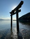 Traditional Japanese red torii gate standing in the sea in Seto Nakia national park Royalty Free Stock Photo