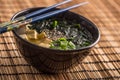 Traditional japanese soup Miso with tofu seaweed chopsticks and Royalty Free Stock Photo